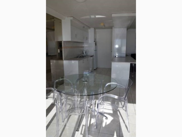 Zenith Oceanfront Apartments - Kitchen and Dining Area